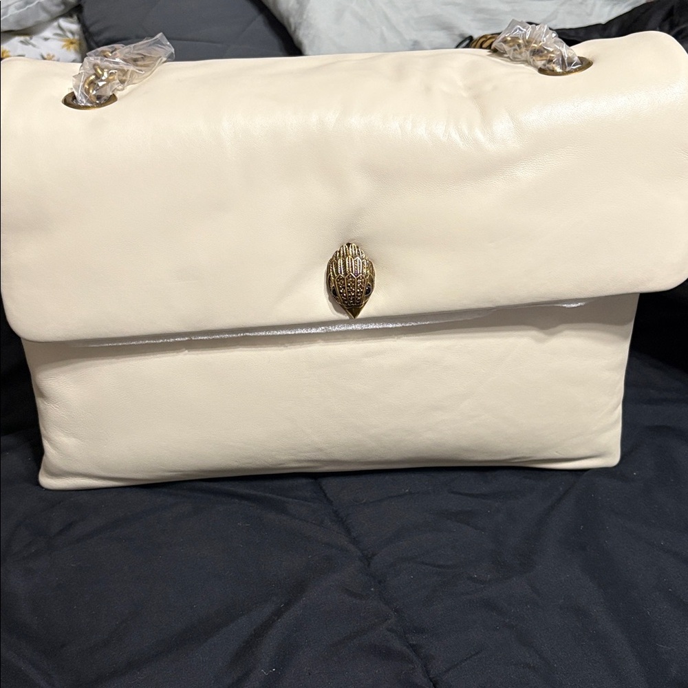 Elegant Cream Shoulder Bag with Gold Accent